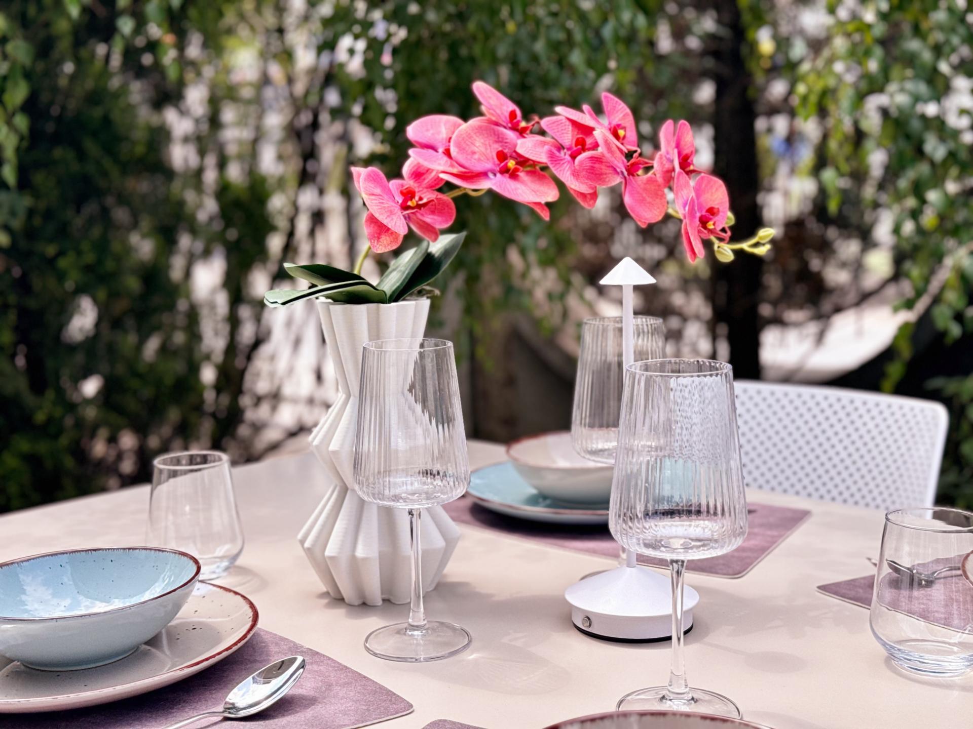 Outdoor dining area with flowers